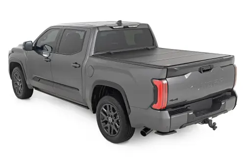Rough Country - 49514551 | Rough Country Hard Tri-Fold Flip Up Bed Cover For Toyota Tundra 2WD/4WD | 5'7" Bed