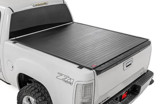 Rough Country - 50123560 | Rough Country Hard Roll Up Bed Cover For Chevrolet Silverado 1500 / GMC Sierra 1500 | 6'7" Bed With Rail Caps