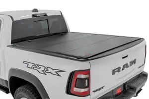 49320550 | Rough Country Hard Tri-Fold Flip Up Bed Cover For Ram 1500 / 1500 TRX | 5'7" Bed