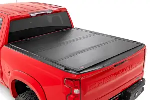 49120650 | Rough Country Hard Tri-Fold Flip Up Bed Cover For Chevrolet Silverado / GMC Sierra 1500 | 6'7" Bed, Standard Bed