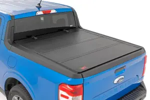 49254500 | Rough Country Hard Tri Fold Flip Up Bed Cover For Ford Maverick 2WD/4WD | 4'6" Bed