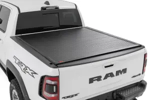 50320550 | Rough Country Hard Roll Up Bed Cover For Ram 1500 / 1500 TRX | 5' 7" Bed
