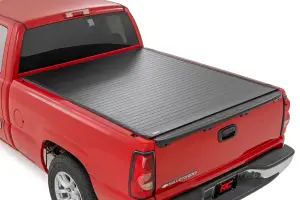 50288650 | Rough Country Hard Roll Up Bed Cover For Chevrolet Silverado 1500 / GMC Sierra 1500 | 6' 7" Bed
