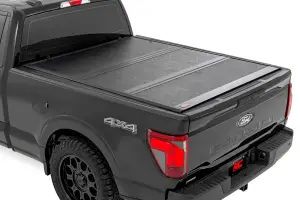47229650_A | Rough Country Hard Low Profile Bed Cover For Ford F150 / F-150 Raptor | 6'7" Bed