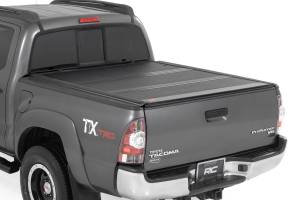 47415500B | Rough Country Hard Low Profile Bed Cover For Toyota Tacoma 2WD/4WD | 5' Bed