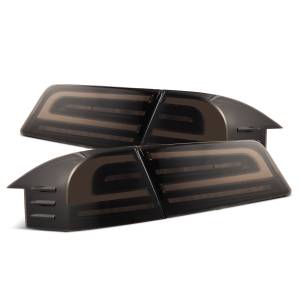 601120 | AlphaRex LUXX-Series LED Tail Lights Black Smoke (With Black Trunk Center Piece Replacement) for Tesla Model S (2012-2021)